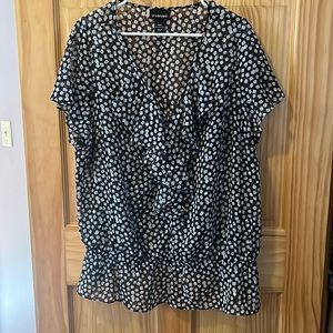 Black with white/gray squares, ruffle front and elastic ruffle around hip/waist